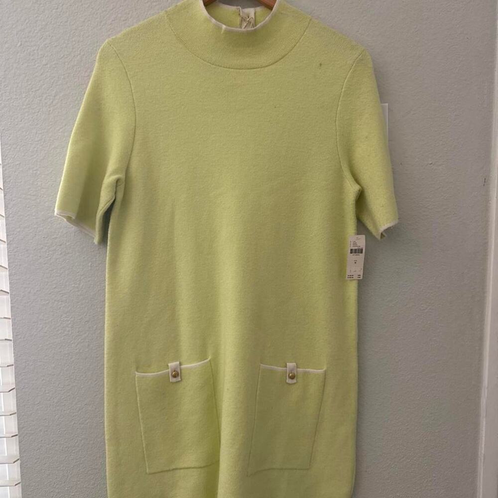 Green sweater dress with pockets